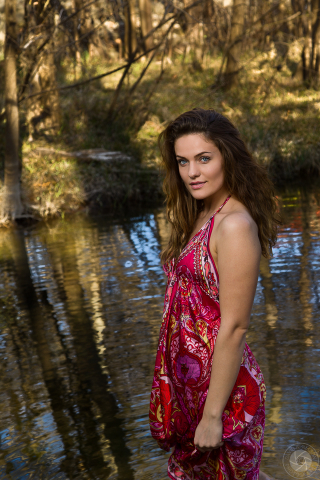 Arbnore in red dress